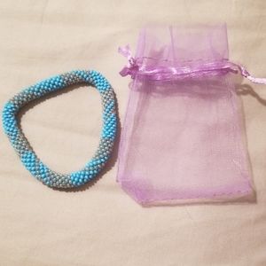 Blue and gray beaded bracelet